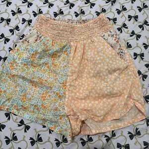 Floral Patchwork Smocked Waist Shorts in Peach with pockets